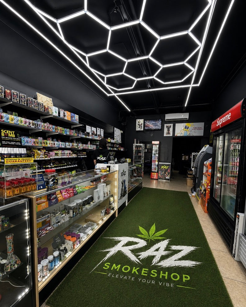 Inside RAZ with geometric lighting and green accents