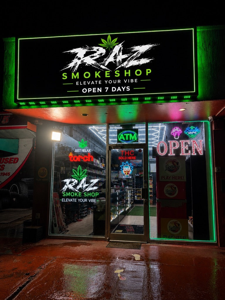 RAZ storefront with illuminated green signage